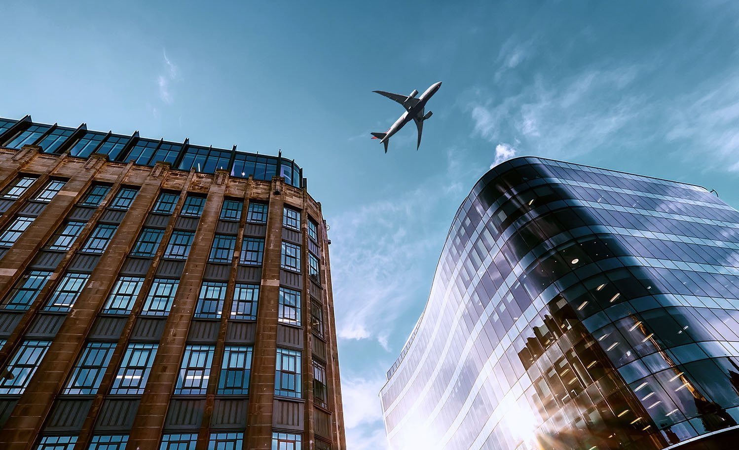 Airplane above Glasgow demonstrating multiple flight data sharing.