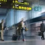 Passengers in an airport representing a connected journey using the Appssenger smartphone app