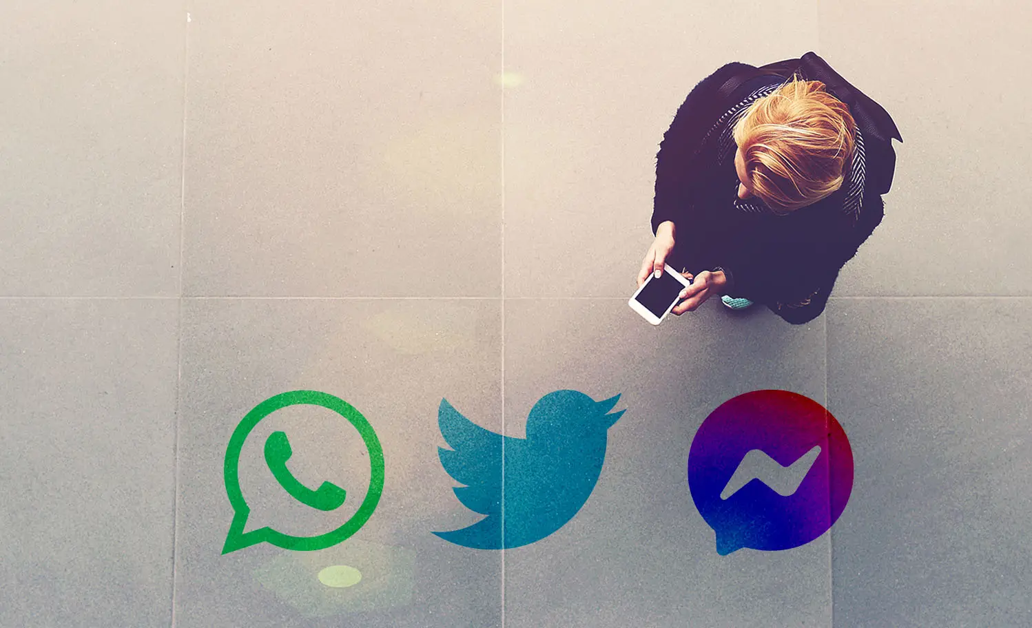 Woman using a smartphone to illustrate enhanced the passenger experience at George Best Belfast City Airport with real-time flight information updates within apps like WhatsApp, Twitter and Facebook Messenger with Airchat and Airport Hive.